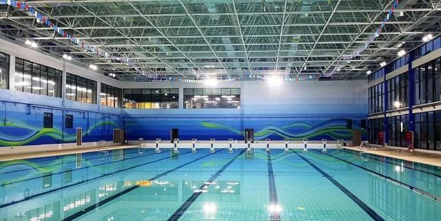四川大學望江游泳館泳池采用全套泳池水處理設備